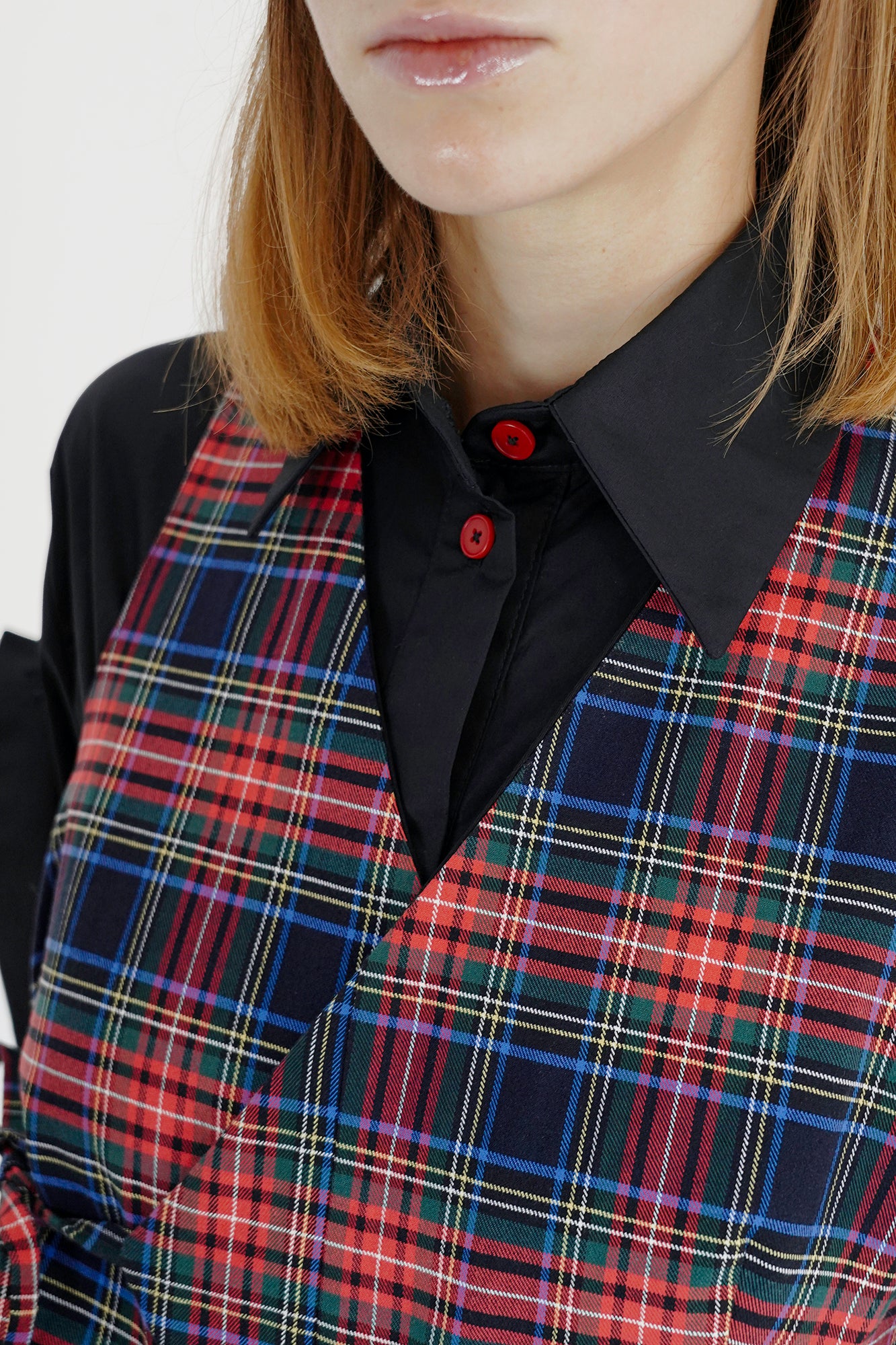 Asymmetric reversible tartan ckeck vest
