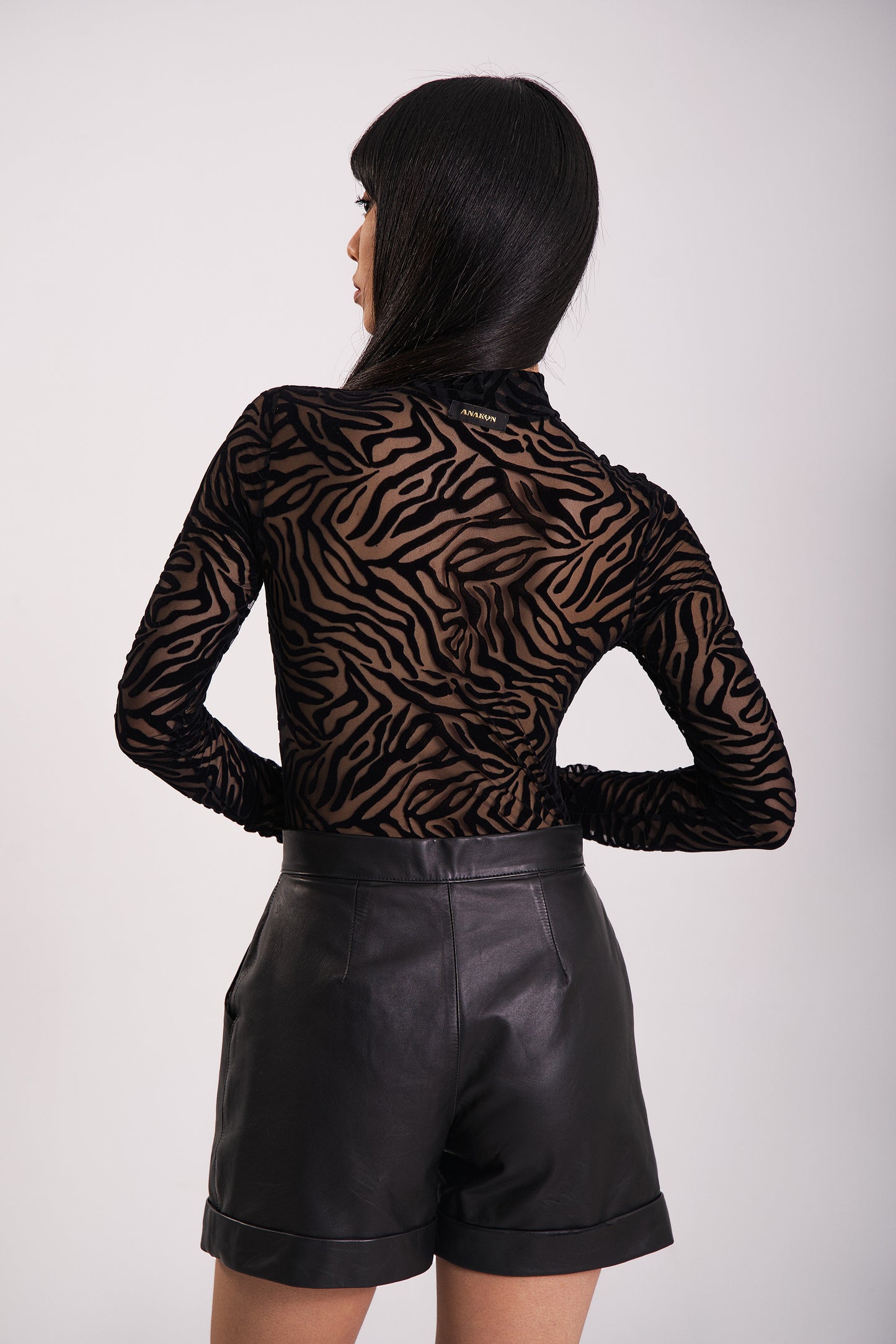 Zebra print long sleeve bodysuit