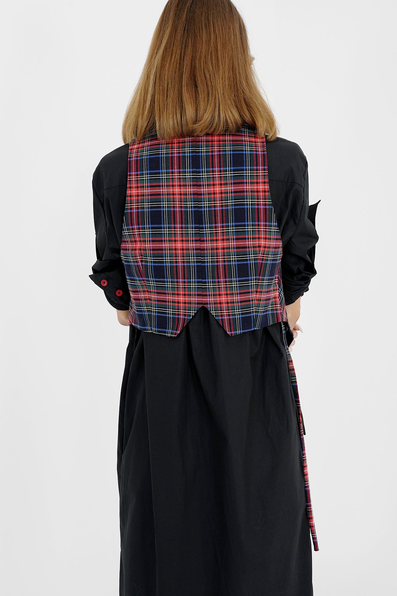 Asymmetric reversible tartan ckeck vest