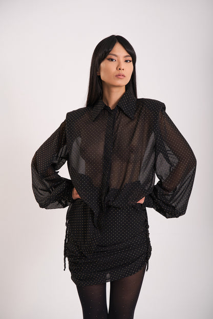 Übergroße schwarze transparente Bluse