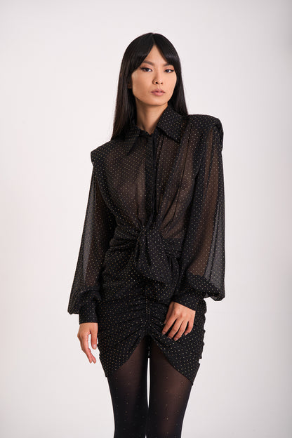 Übergroße schwarze transparente Bluse